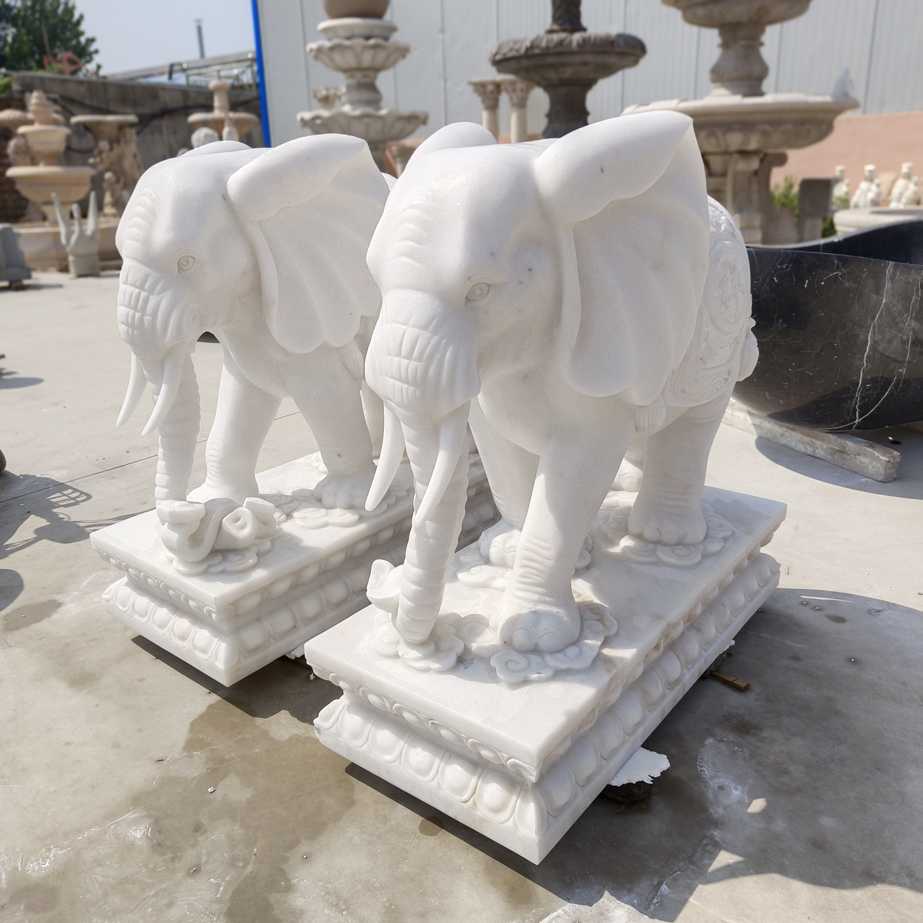 https://www.eastsculpture.com/door-front-decoration-hand-carved-animal-sculpture-white-marble-stone-elephant-statue-product/