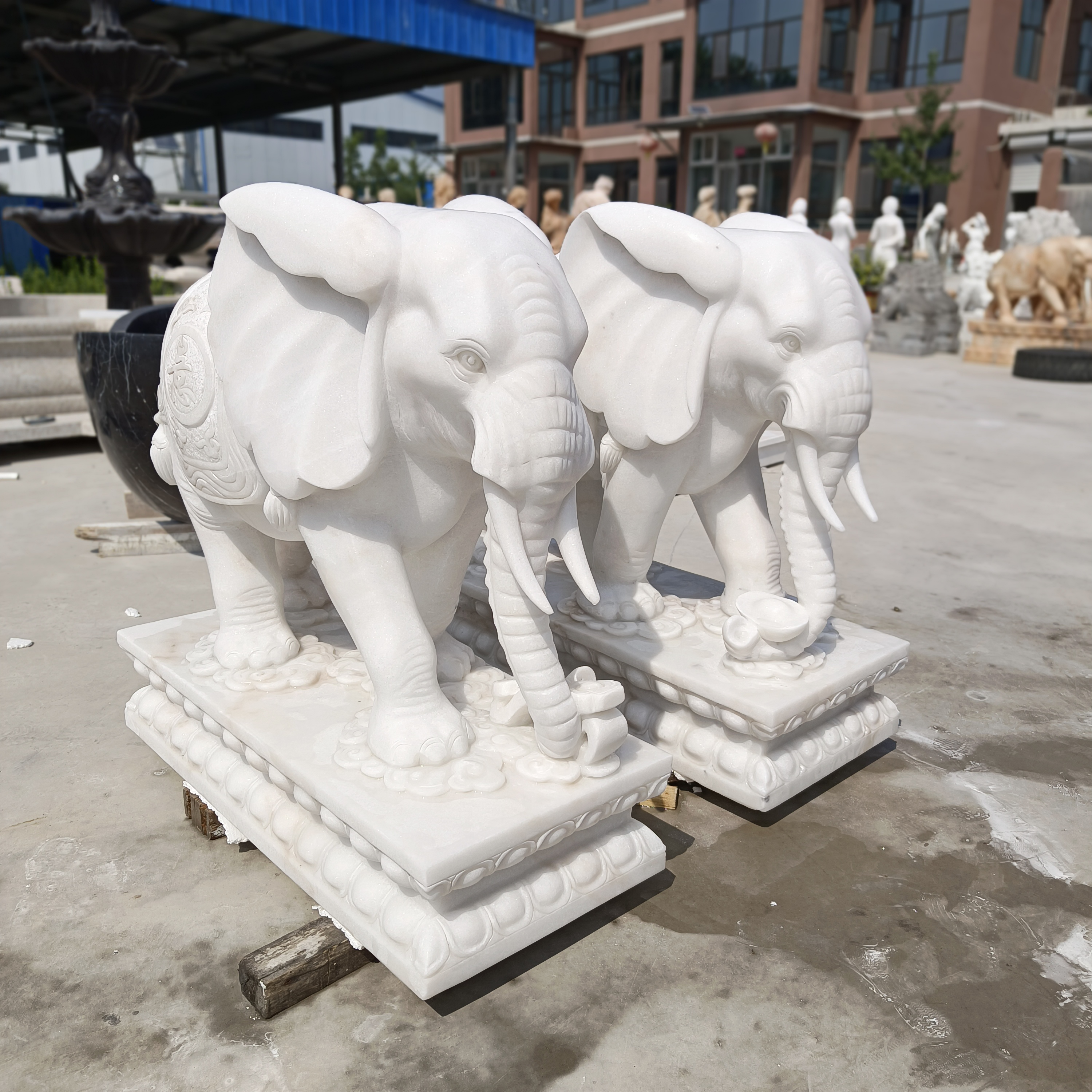 https://www.eastsculpture.com/door-front-decoration-hand-carved-animal-sculpture-white-marble-stone-elephant-statue-product/